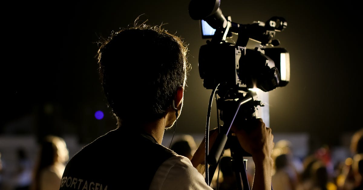 shallow-focus-photo-of-cameraman